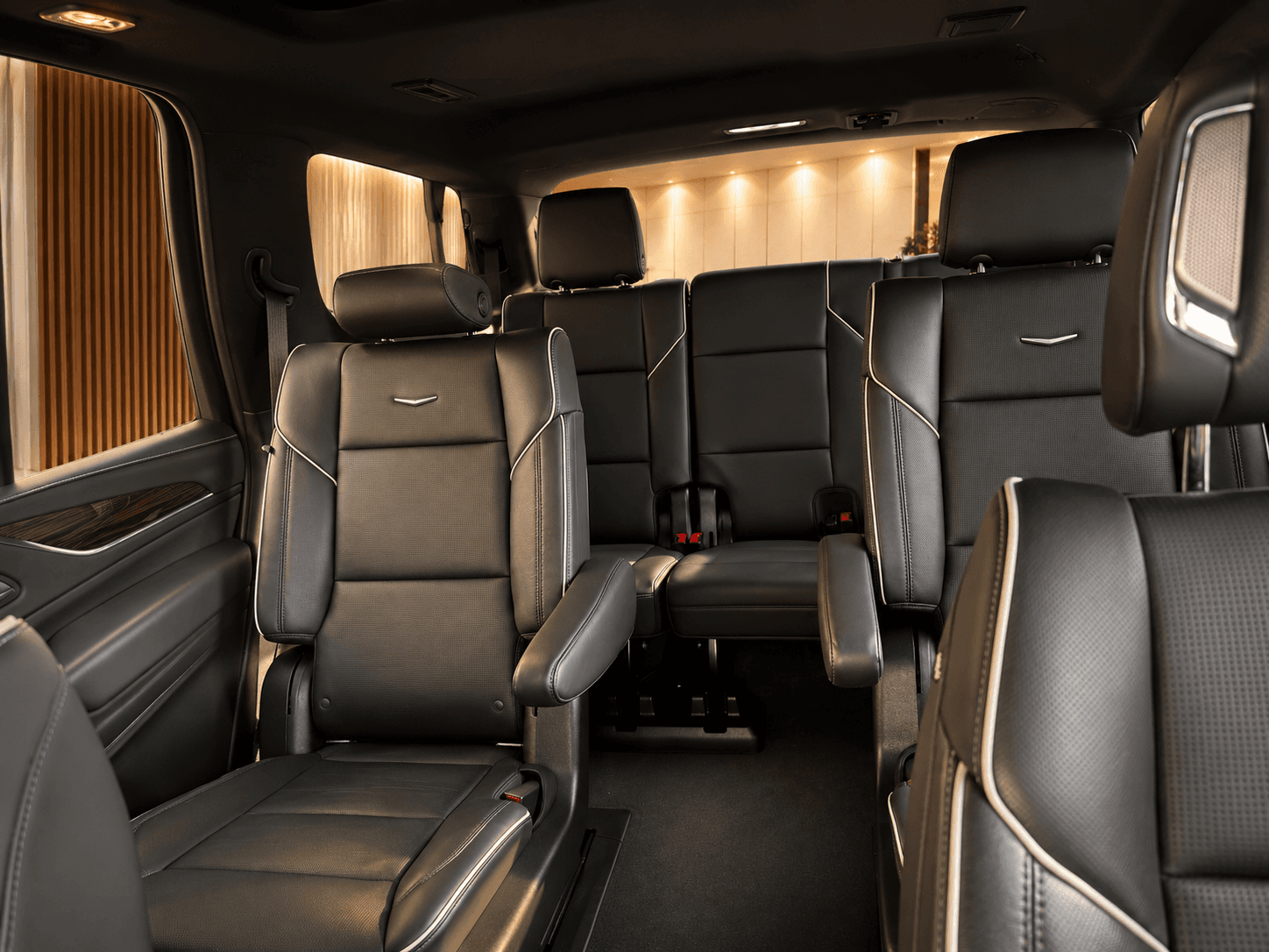 Cadillac Escalade ESV second-row captain's chair in black leather with contrast piping