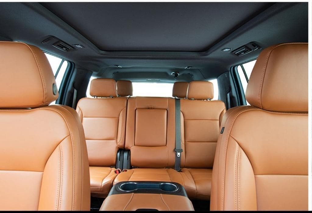 GMC Yukon Elevation second- and third-row seating in saddle-tan leather