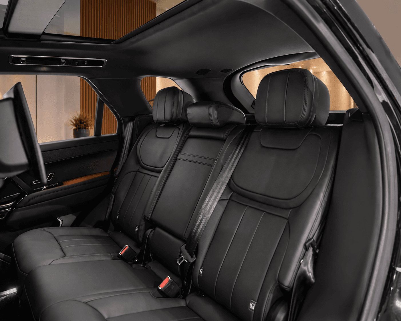 Range Rover Autobiography rear cabin in black leather beneath a panoramic roof