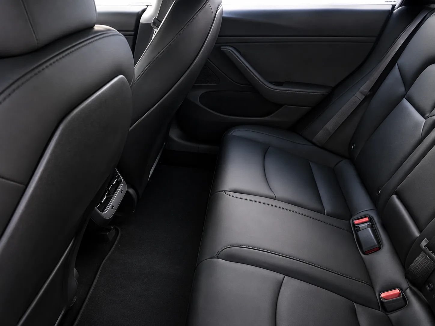 Tesla Model 3 rear seats with centre console air vents