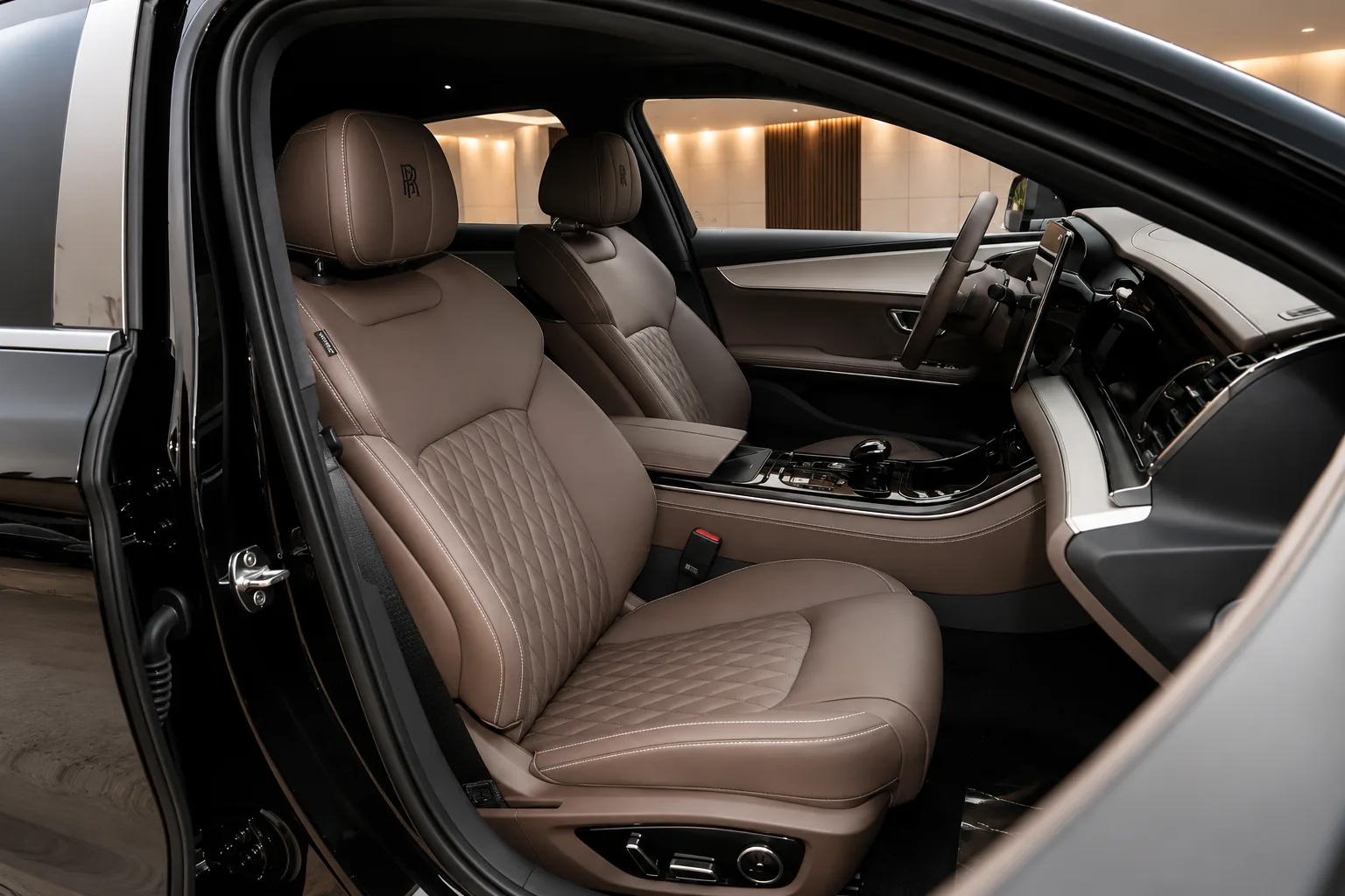 BYD Han front cabin with taupe quilted leather seats and centre console